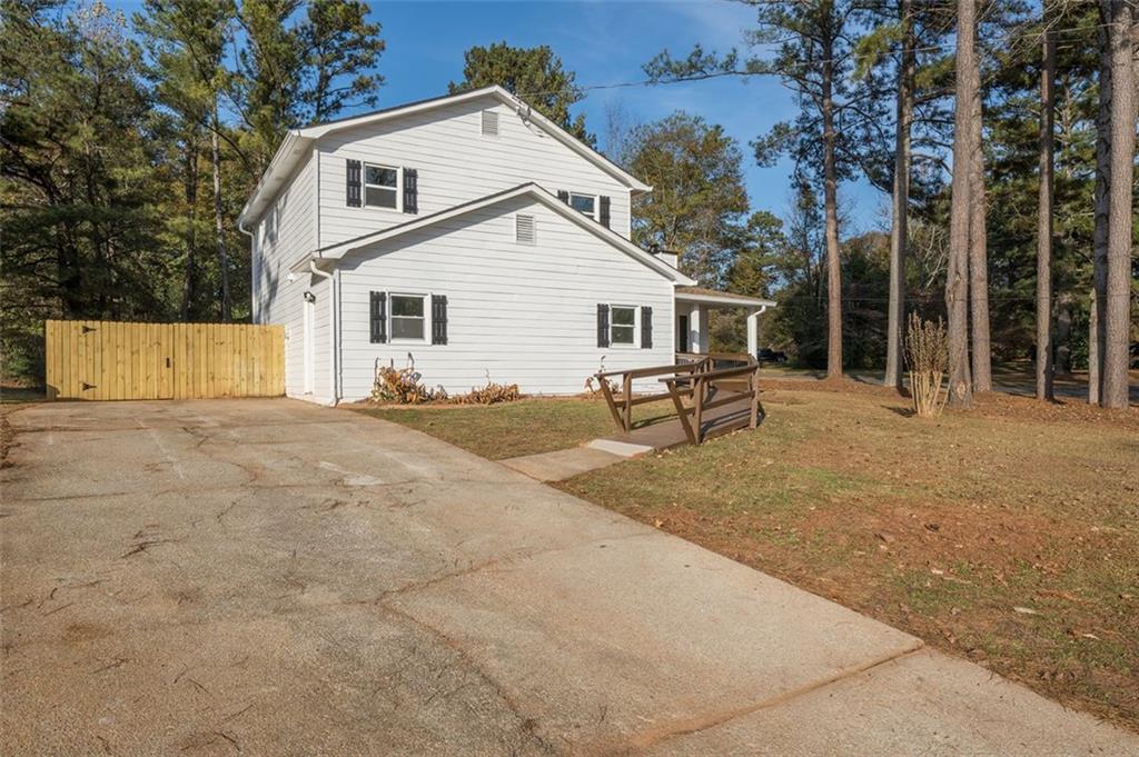 5081 Hubert Drive Powder Springs, GA 30127 - Photo 2 of 32 a view of a house with a patio