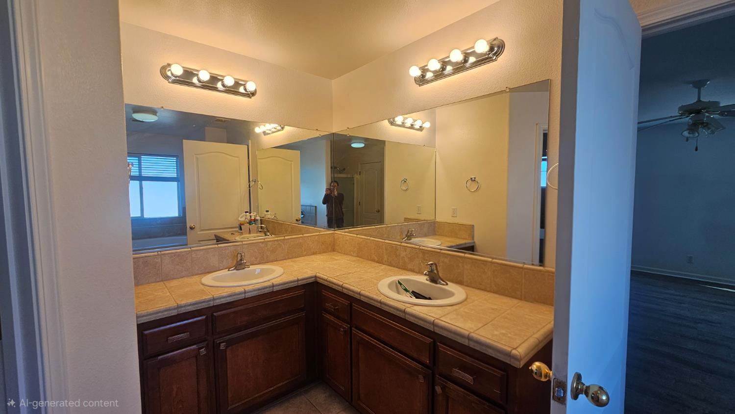 580 West Sunset Street Kingsburg, CA 93631 - Photo 8 of 12 a bathroom with a sink and a mirror