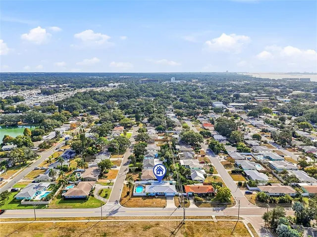 an aerial view of a houses with outdoor space