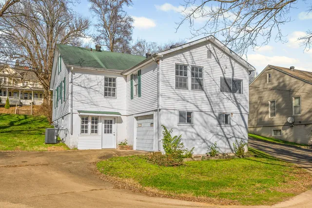 a view of swimming pool from a balcony