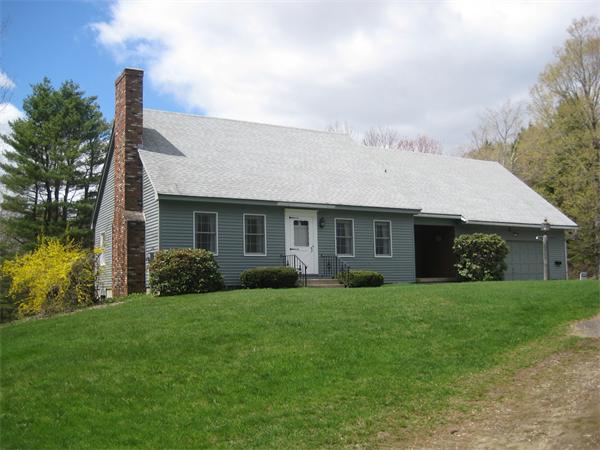477 Main Road Chesterfield, MA 01012 - Photo 1 of 1 a front view of a house with a garden and yard