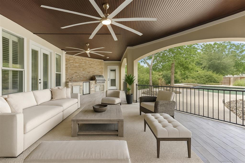 2203 Court Del Rey Round Rock, TX 78681 - Photo 2 of 35 View of patio with an outdoor kitchen, french doors, an outdoor living space, and ceiling fan
