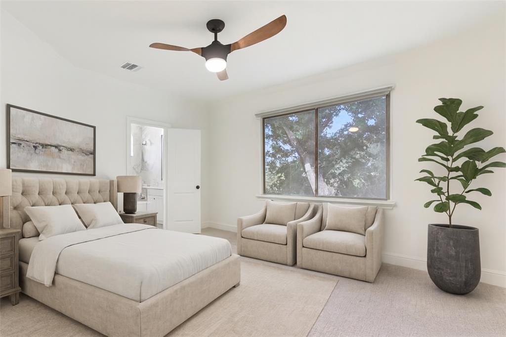 2203 Court Del Rey Round Rock, TX 78681 - Photo 28 of 35 Carpeted bedroom with a ceiling fan and baseboards