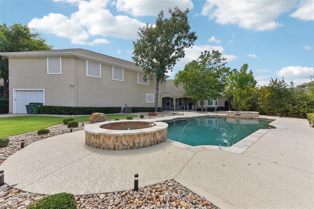 2203 Court Del Rey Round Rock, TX 78681 - Photo 30 of 35 View of swimming pool featuring a patio area and a pool with connected hot tub