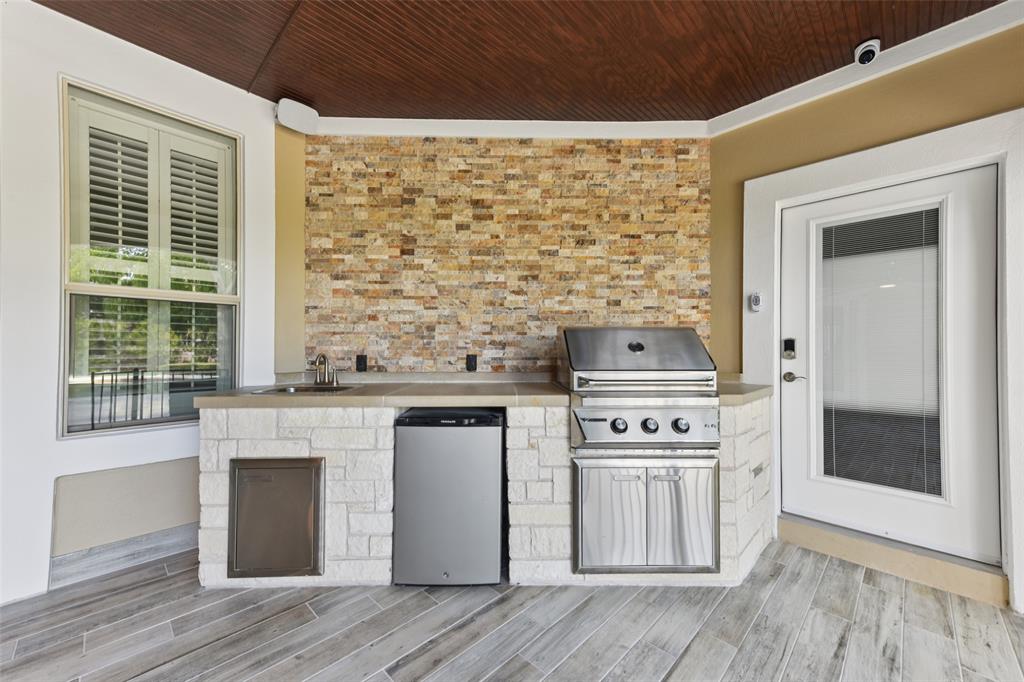 2203 Court Del Rey Round Rock, TX 78681 - Photo 32 of 35 View of patio / terrace featuring an outdoor kitchen and a deck