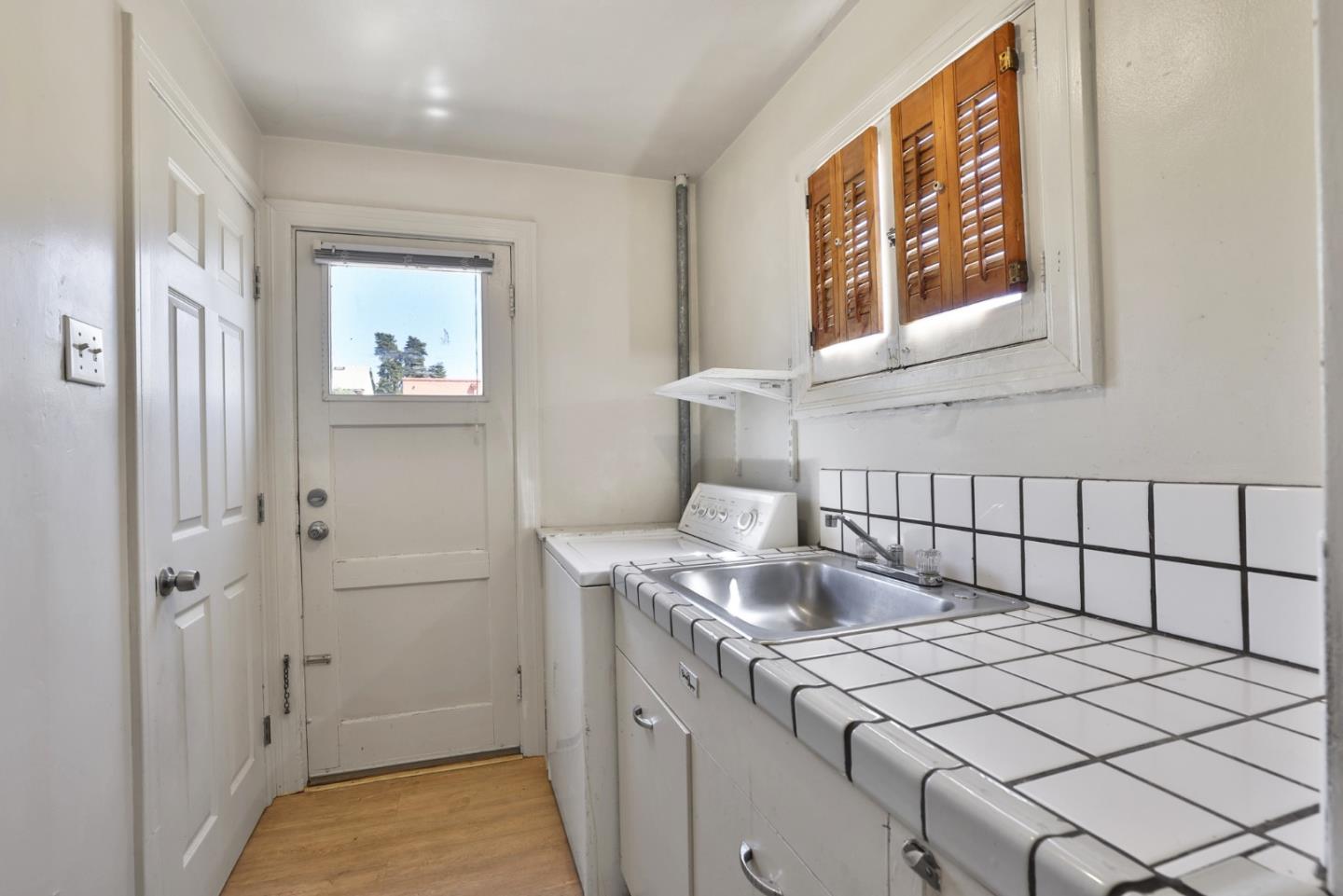 494 Lewis Avenue San Leandro, CA 94577 - Photo 15 of 19 a bathroom with a sink and a window