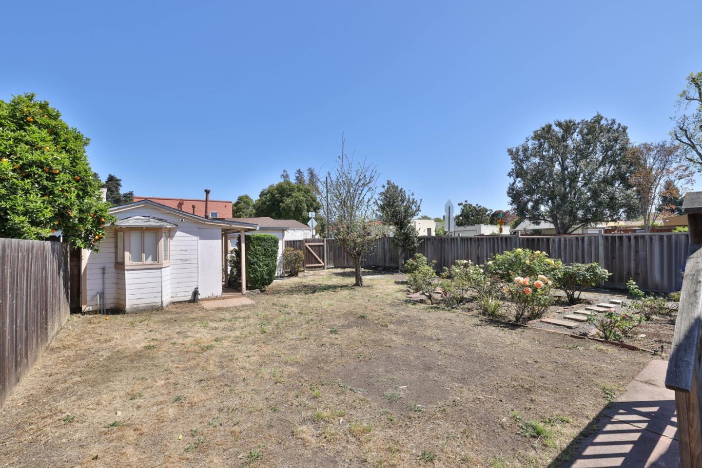 494 Lewis Avenue San Leandro, CA 94577 - Photo 17 of 19 a view of a chair and table in the backyard