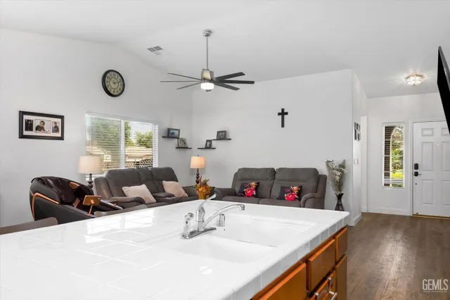 a living room with furniture and a window
