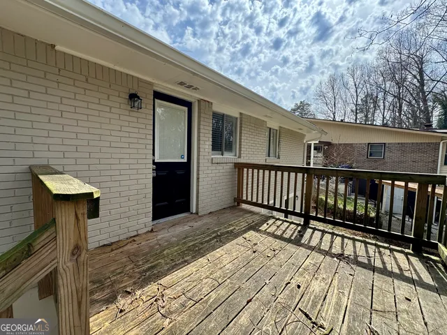 a view of a house with a small yard