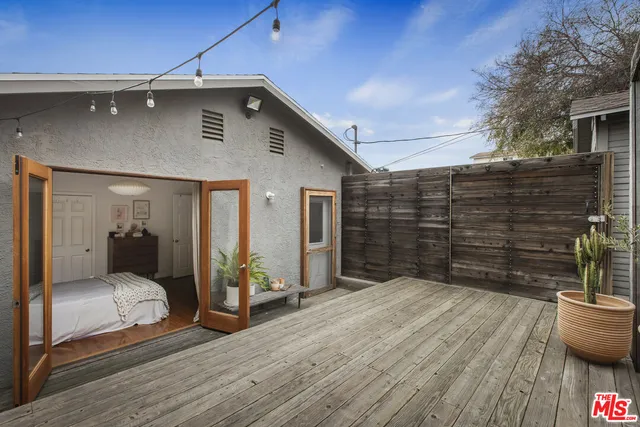 a bathroom with a sink tub and a mirror