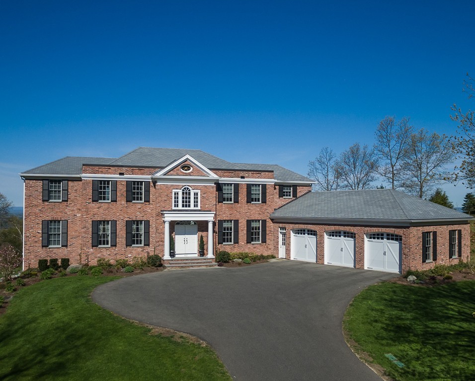 821 Ridge Road Wilbraham, MA 01095 - Photo 1 of 30 a front view of a house with a yard