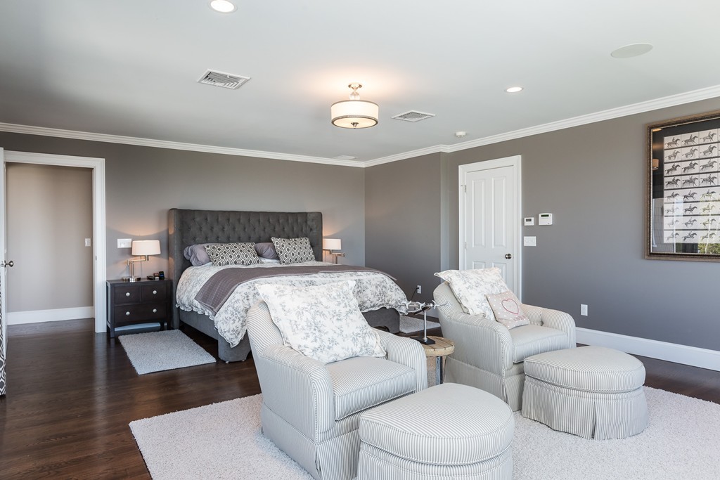 821 Ridge Road Wilbraham, MA 01095 - Photo 12 of 30 a bedroom with a bed and wooden floor