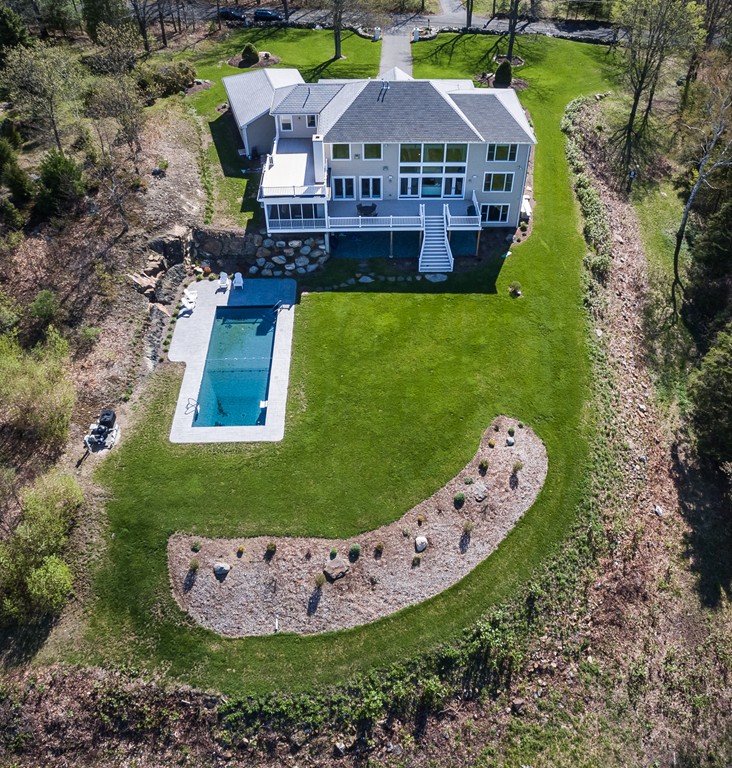 821 Ridge Road Wilbraham, MA 01095 - Photo 2 of 30 an aerial view of a house with swimming pool outdoor seating and yard