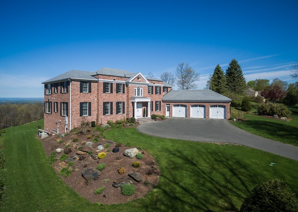 821 Ridge Road Wilbraham, MA 01095 - Photo 23 of 30 a front view of a house with a garden