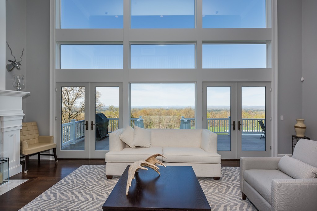 821 Ridge Road Wilbraham, MA 01095 - Photo 8 of 30 a living room with furniture and a floor to ceiling window