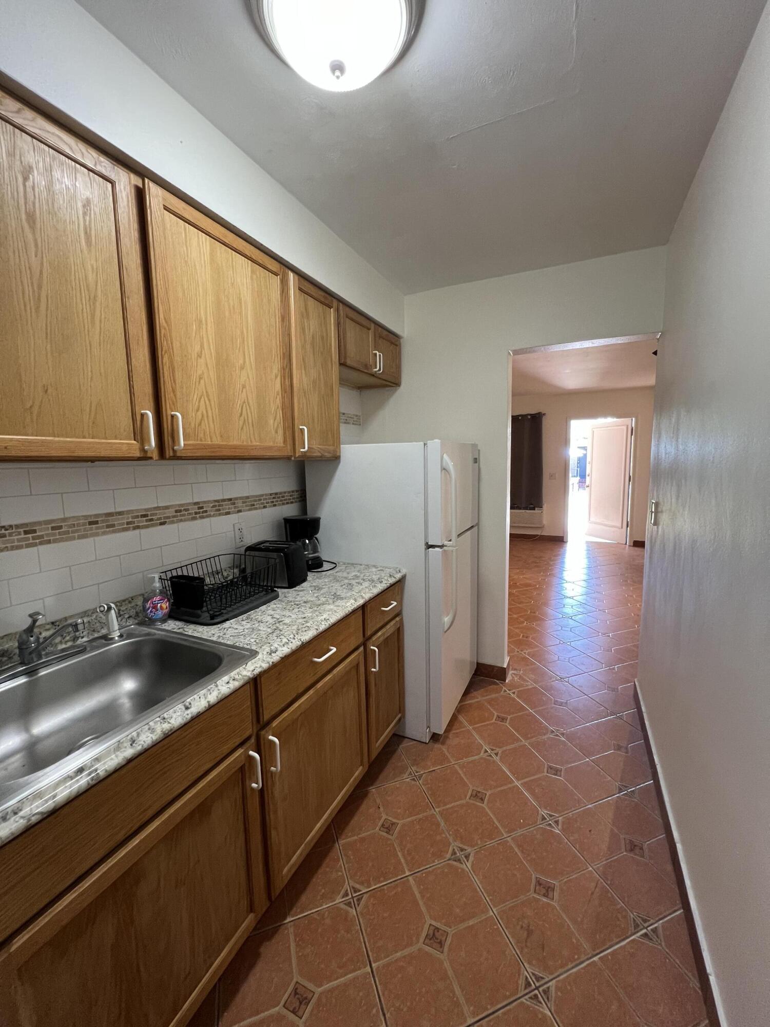 311 Inlet Way, Unit 11 Palm Beach Shores, FL 33404 - Photo 8 of 15 IMG_1383