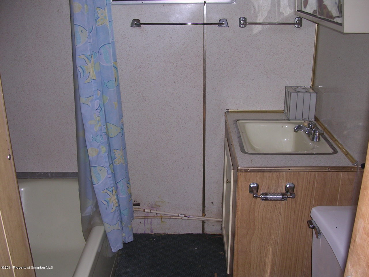 River Road Meshoppen, PA 18630 - Photo 5 of 7 a bathroom with a sink and glass door