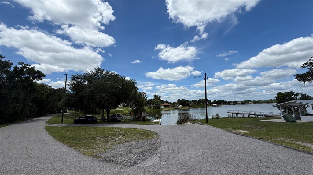 0 Lakeview Street Umatilla, FL 32784 - Photo 9 of 14 a view of a lake with a house in the background