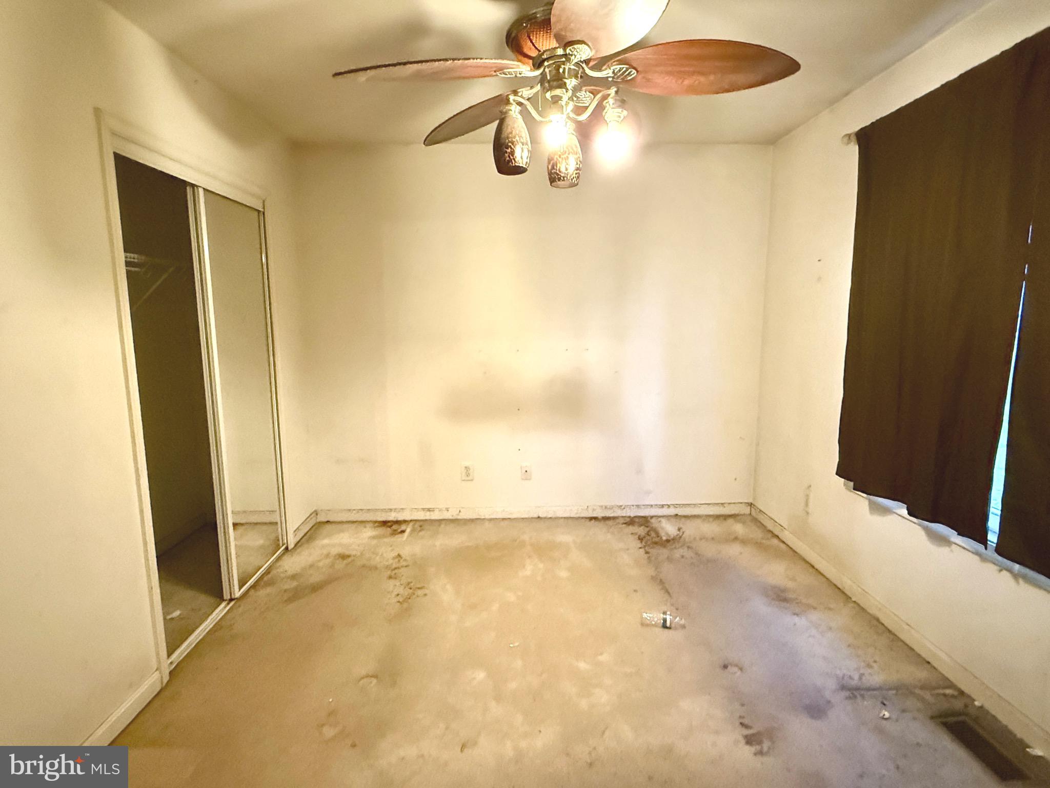 52 Morgan Street Inwood, WV 25428 - Photo 13 of 26 a view of an empty room with a window