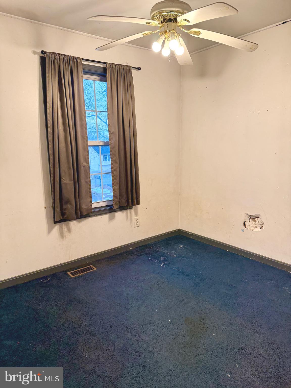 52 Morgan Street Inwood, WV 25428 - Photo 15 of 26 a view of an empty room with a window