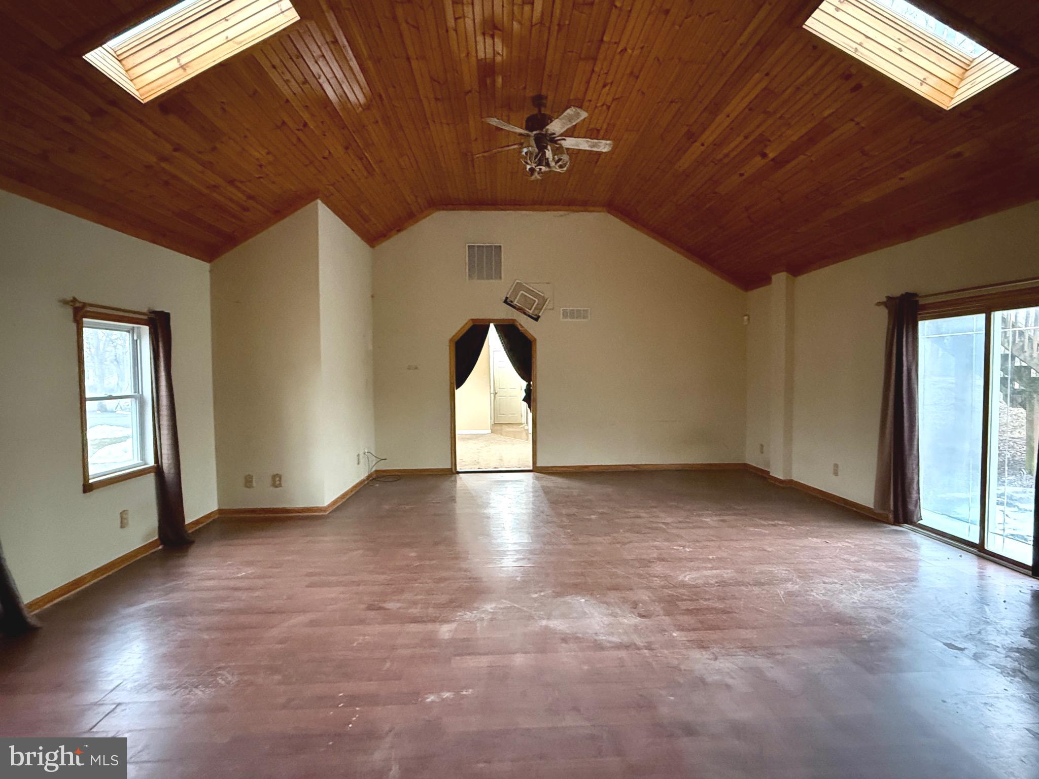 52 Morgan Street Inwood, WV 25428 - Photo 20 of 26 a view of empty room with windows
