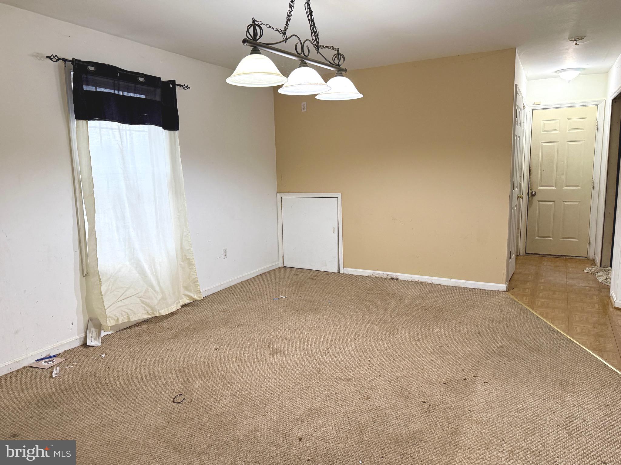 52 Morgan Street Inwood, WV 25428 - Photo 21 of 26 a view of a livingroom with a chandelier