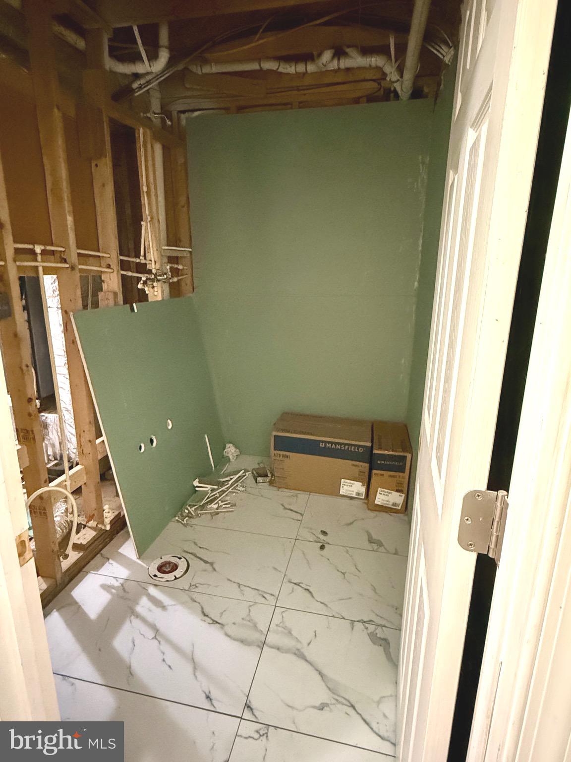 52 Morgan Street Inwood, WV 25428 - Photo 25 of 26 a bathroom with a sink and a toilet