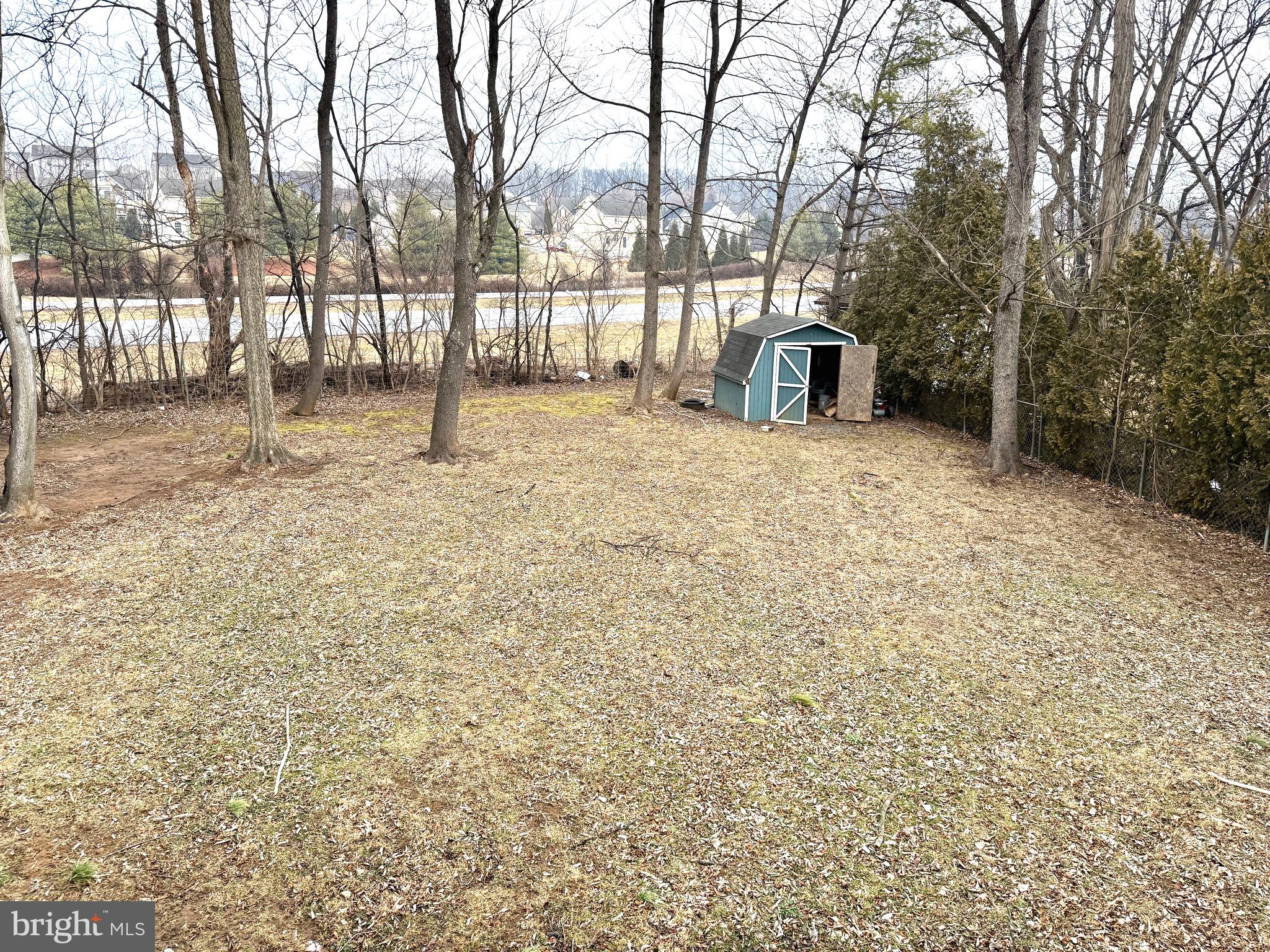 52 Morgan Street Inwood, WV 25428 - Photo 5 of 26 a front view of a house with a yard