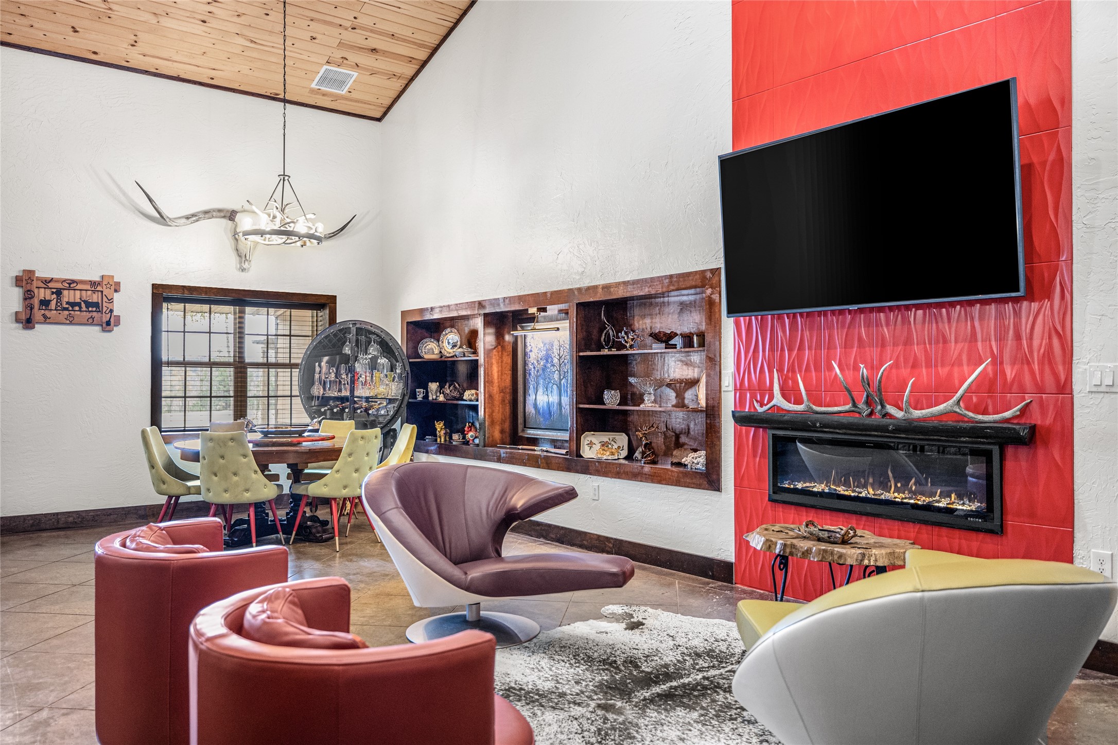 495 Everitt Road Cleveland, TX 77328 - Photo 14 of 43 a living room with furniture and a flat screen tv