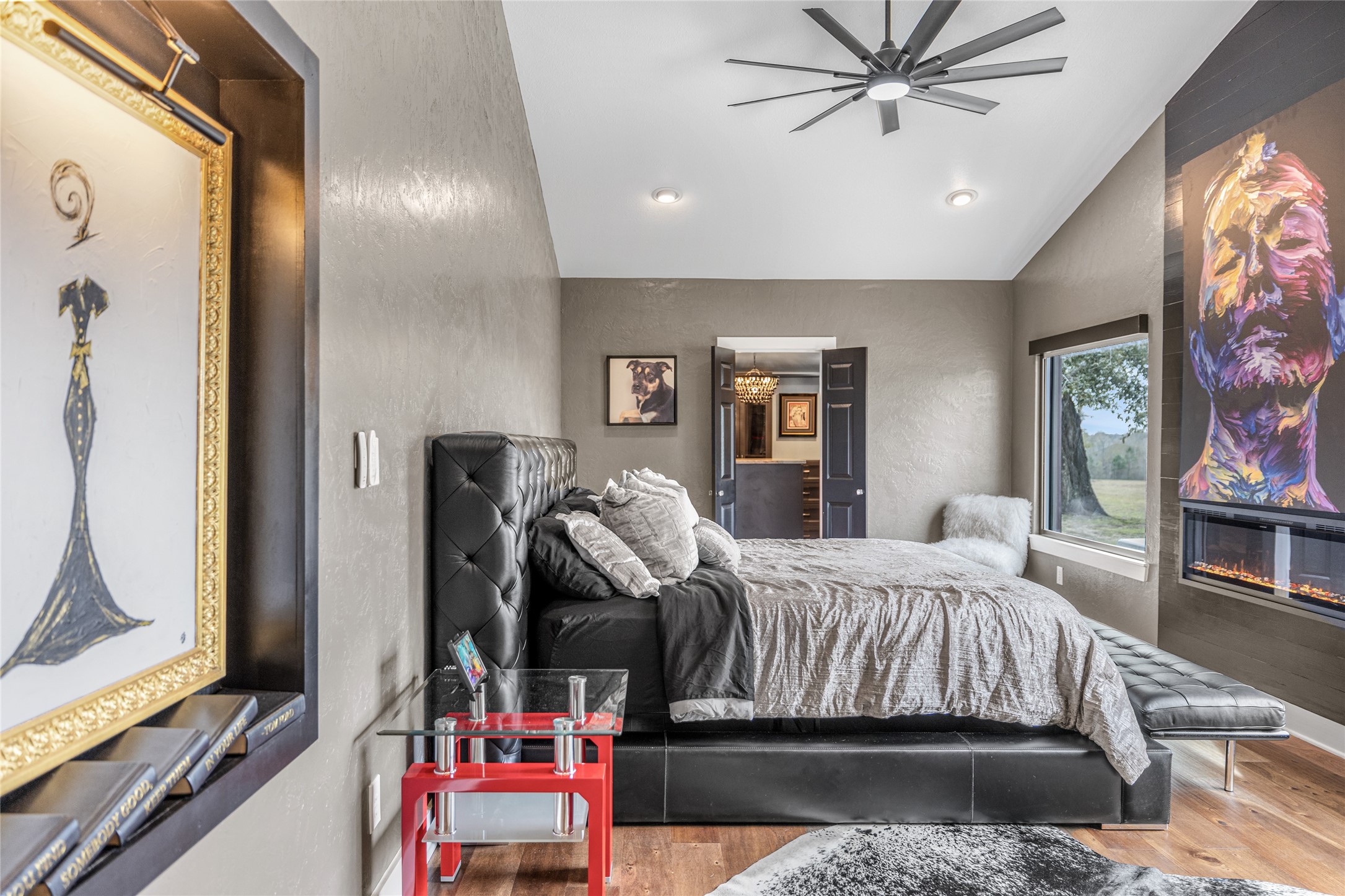 495 Everitt Road Cleveland, TX 77328 - Photo 24 of 43 a bedroom with a bed and wooden floor