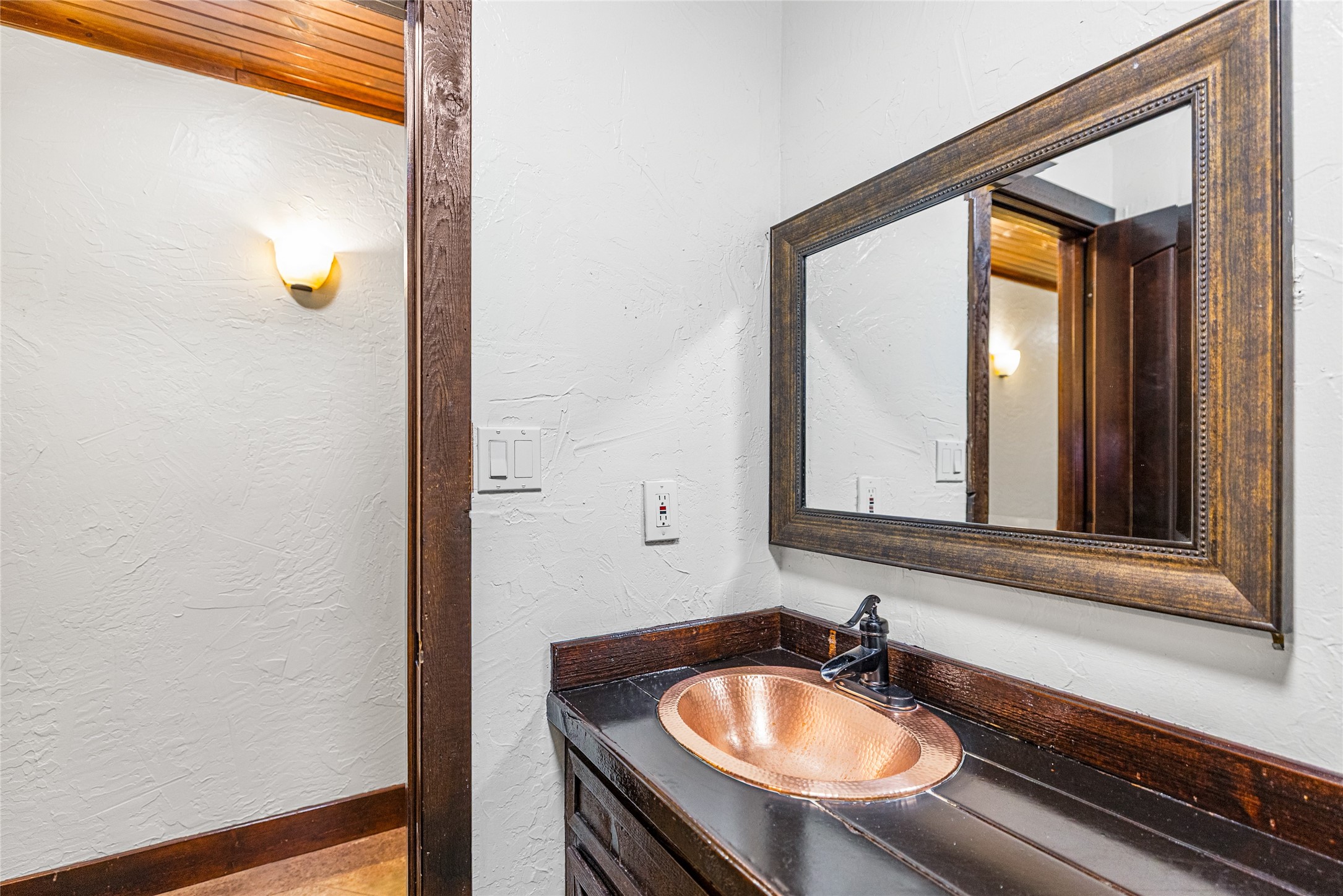 495 Everitt Road Cleveland, TX 77328 - Photo 31 of 43 a bathroom with a sink and a mirror