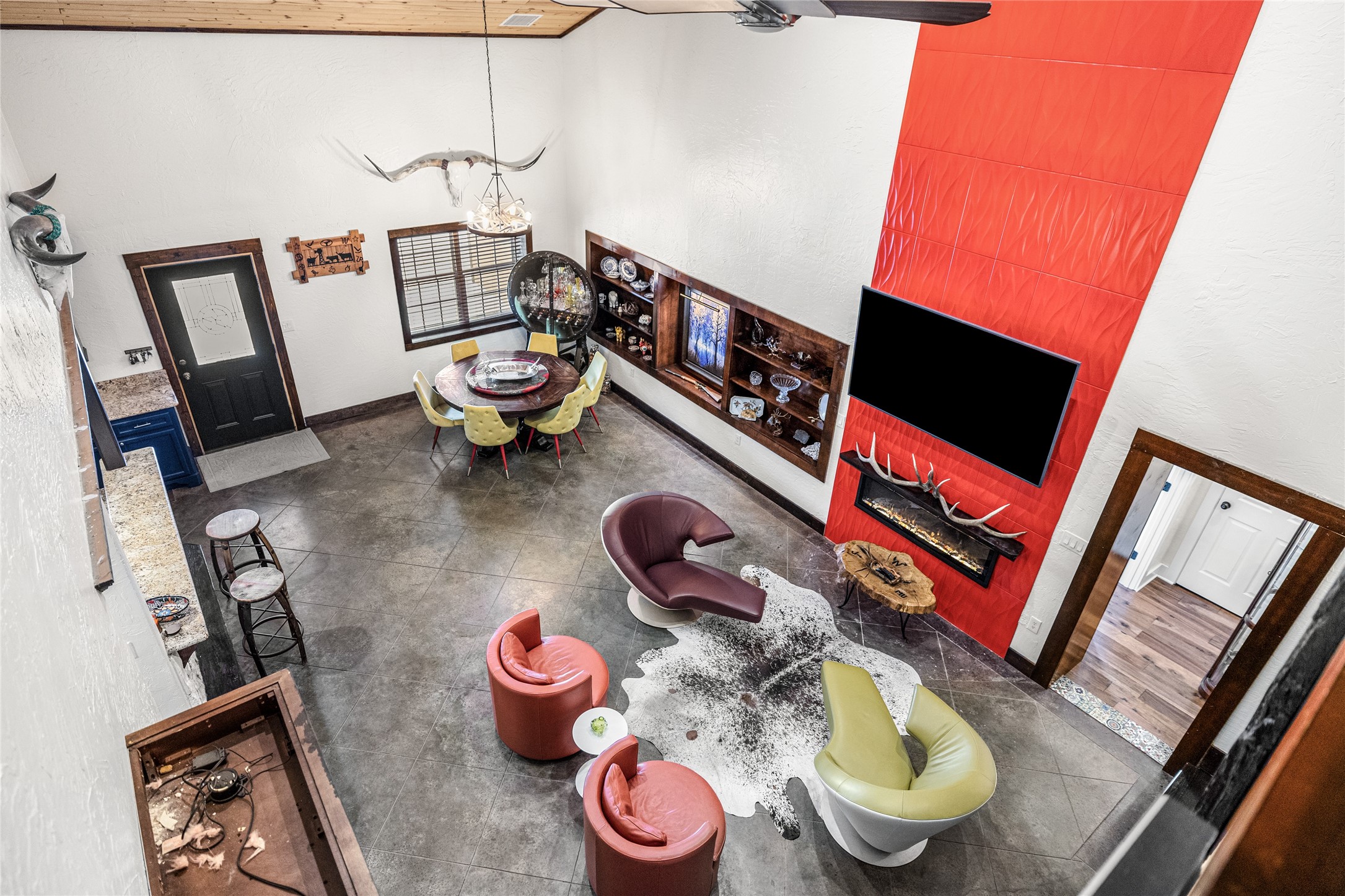 495 Everitt Road Cleveland, TX 77328 - Photo 36 of 43 a living room with furniture and a wooden floor