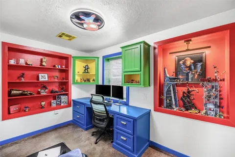 a very nice looking room with a flat screen tv