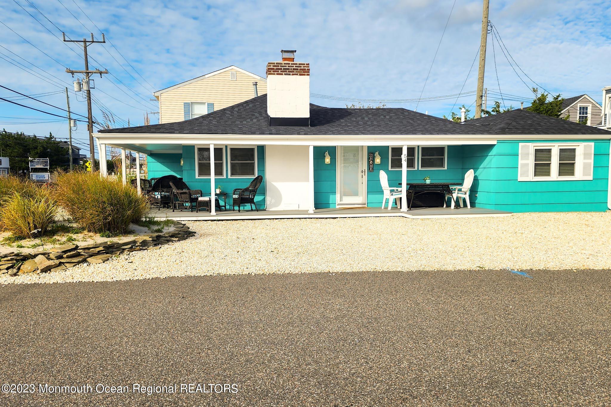 54 Silver Beach Road Lavallette, NJ 08735 - Photo 12 of 49 a front view of a house with a yard
