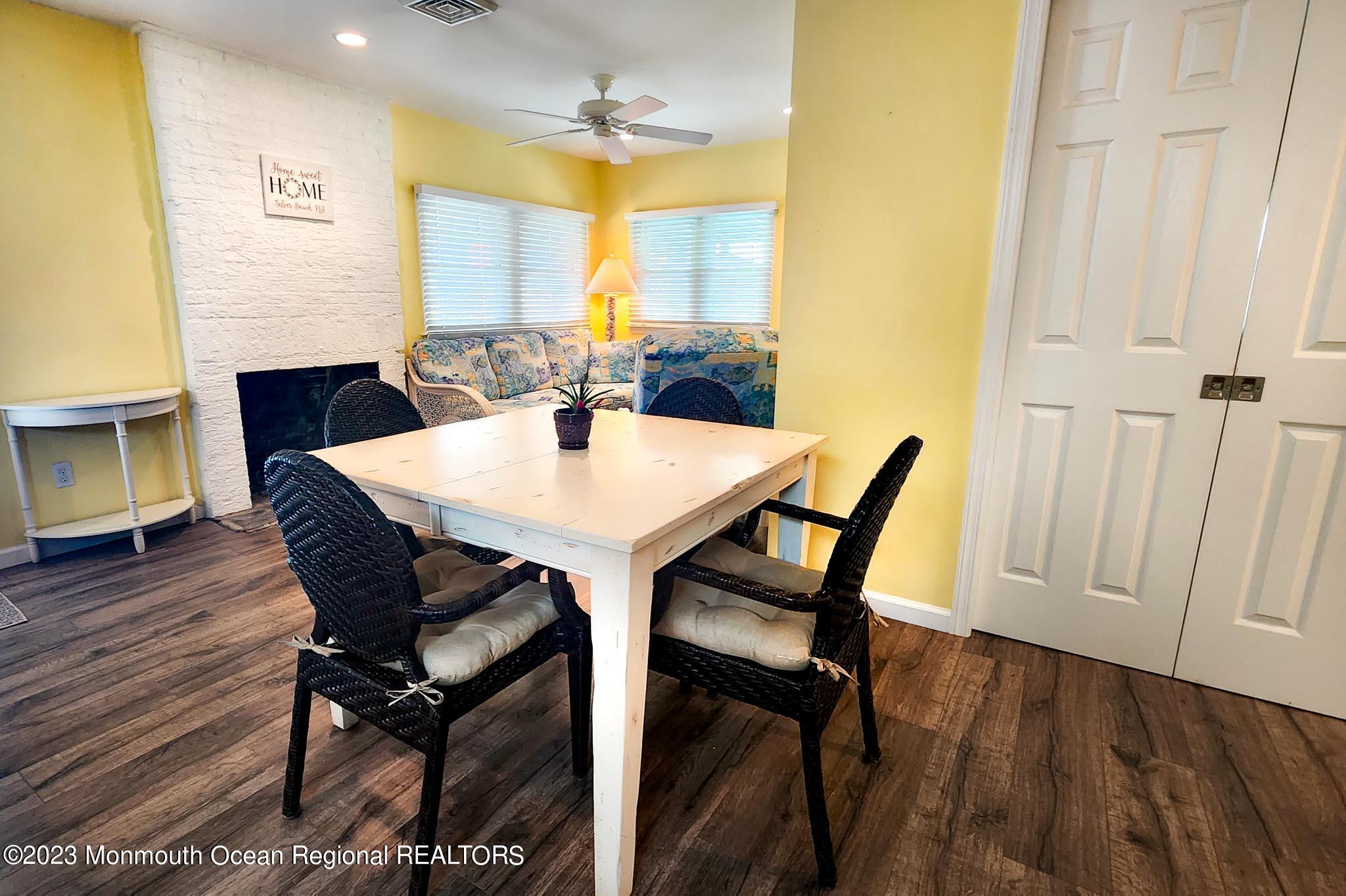54 Silver Beach Road Lavallette, NJ 08735 - Photo 19 of 49 a view of a dining room with furniture and wooden floor