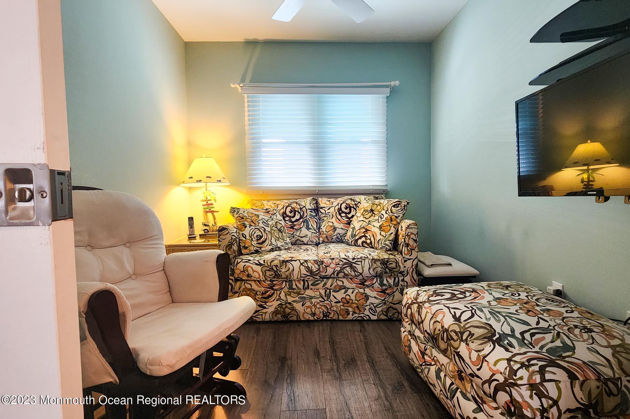 54 Silver Beach Road Lavallette, NJ 08735 - Photo 26 of 49 a bedroom with two beds and a couch