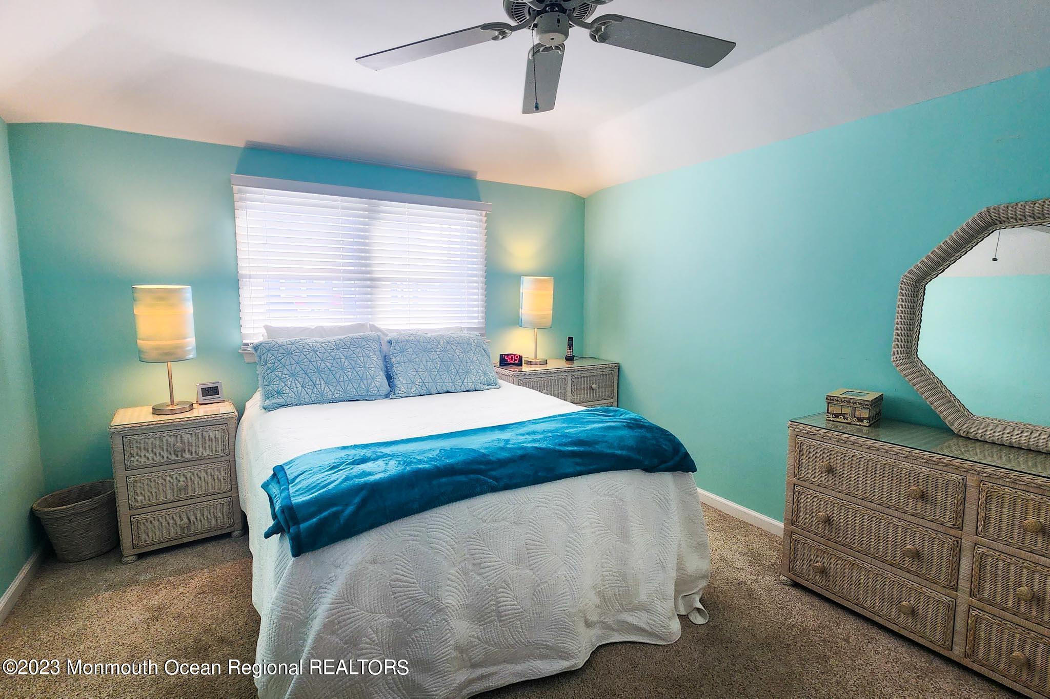 54 Silver Beach Road Lavallette, NJ 08735 - Photo 34 of 49 a bedroom with a bed window and dresser
