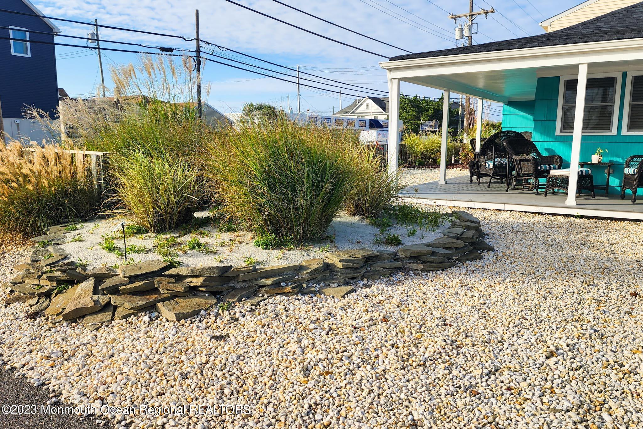 54 Silver Beach Road Lavallette, NJ 08735 - Photo 38 of 49 a view of a house with backyard and sitting area