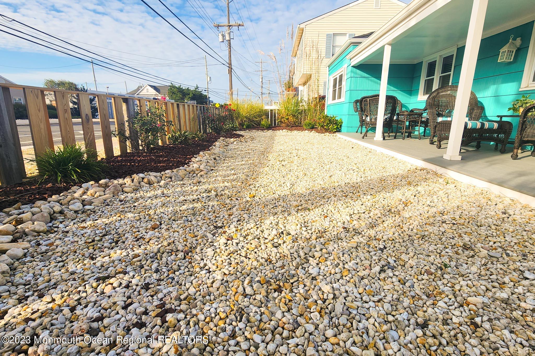 54 Silver Beach Road Lavallette, NJ 08735 - Photo 40 of 49 a view of a backyard of the house