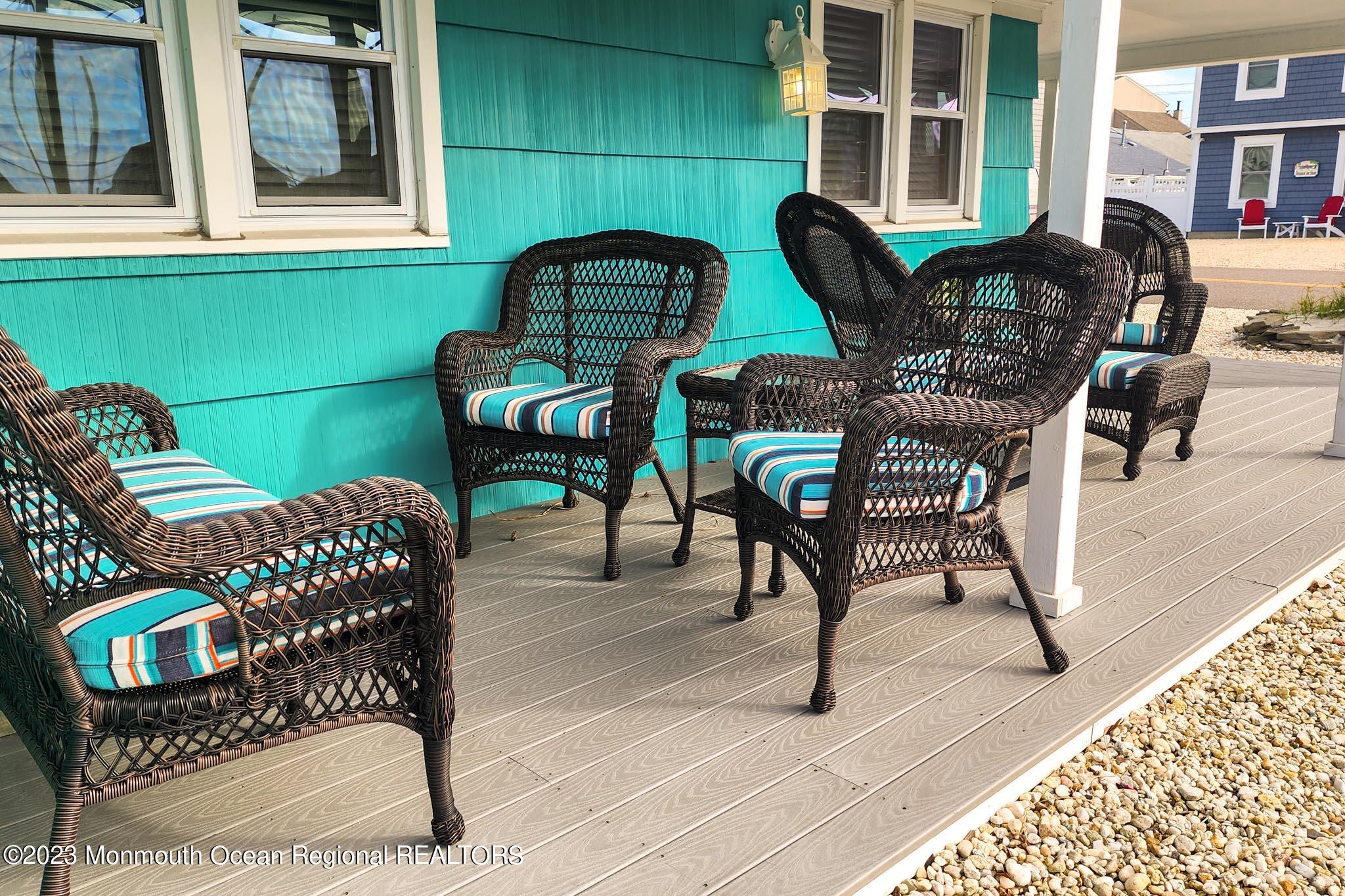 54 Silver Beach Road Lavallette, NJ 08735 - Photo 42 of 49 a view of a chairs and table in the patio