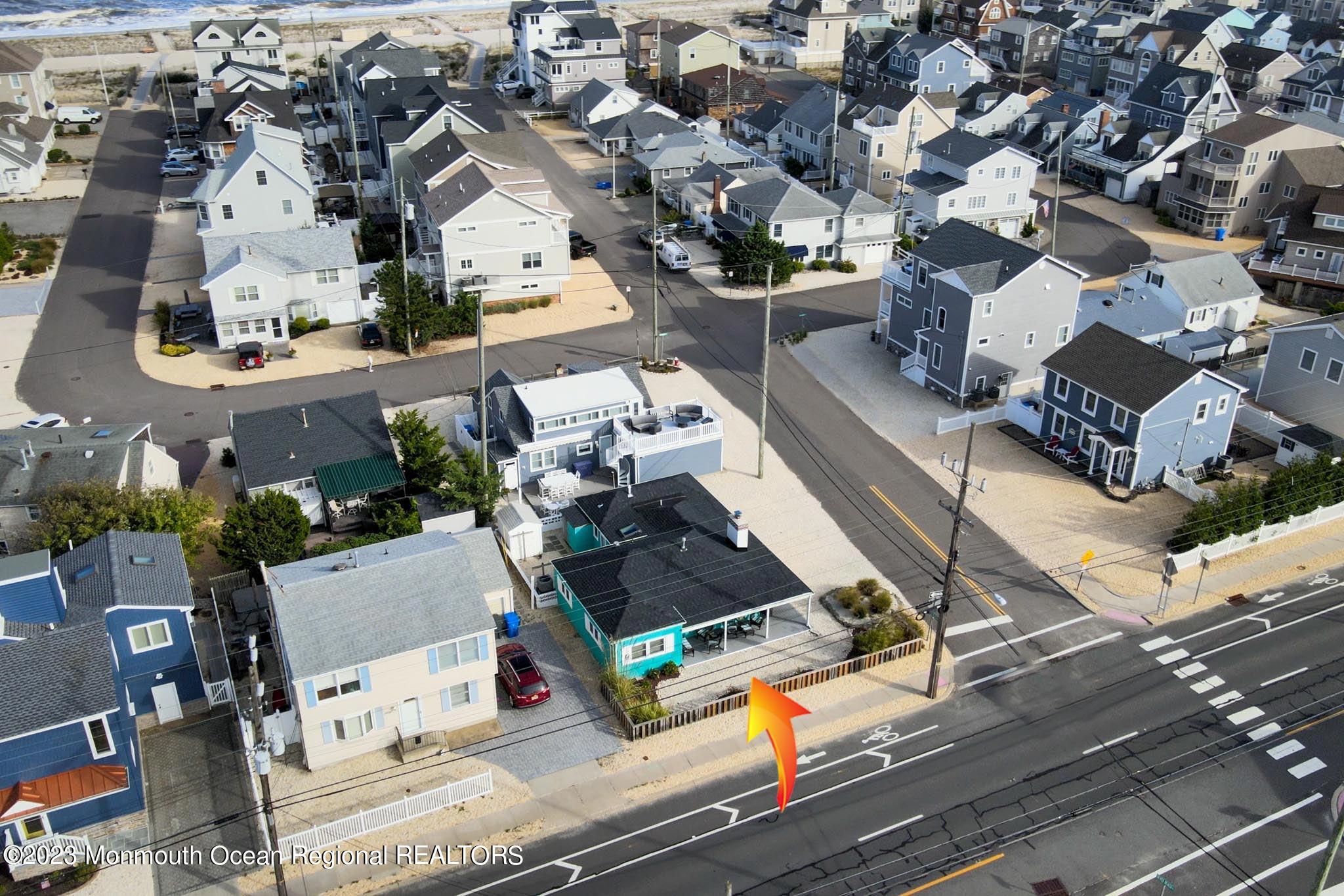 54 Silver Beach Road Lavallette, NJ 08735 - Photo 7 of 49 an aerial view of a house with a yard