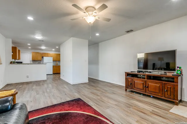a view of kitchen with sink and microwave