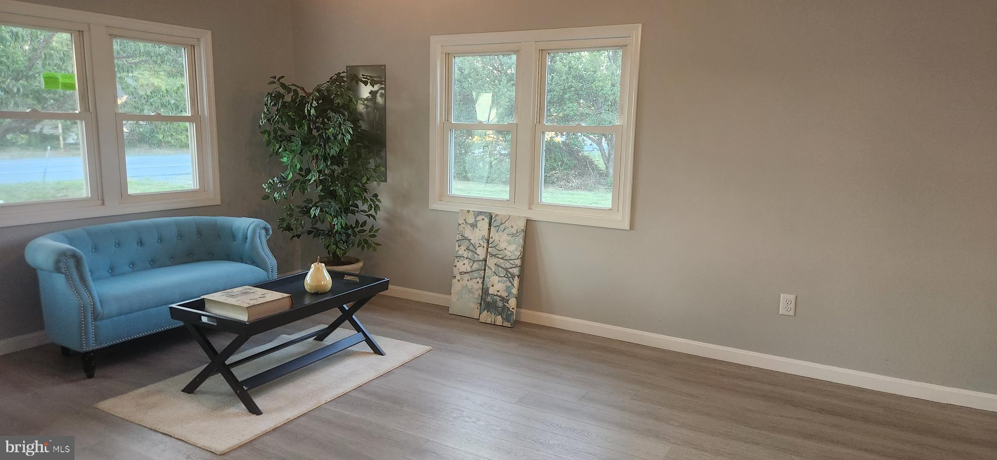 10819 Greensboro Road Denton, MD 21629 - Photo 21 of 27 a living room with furniture and a window