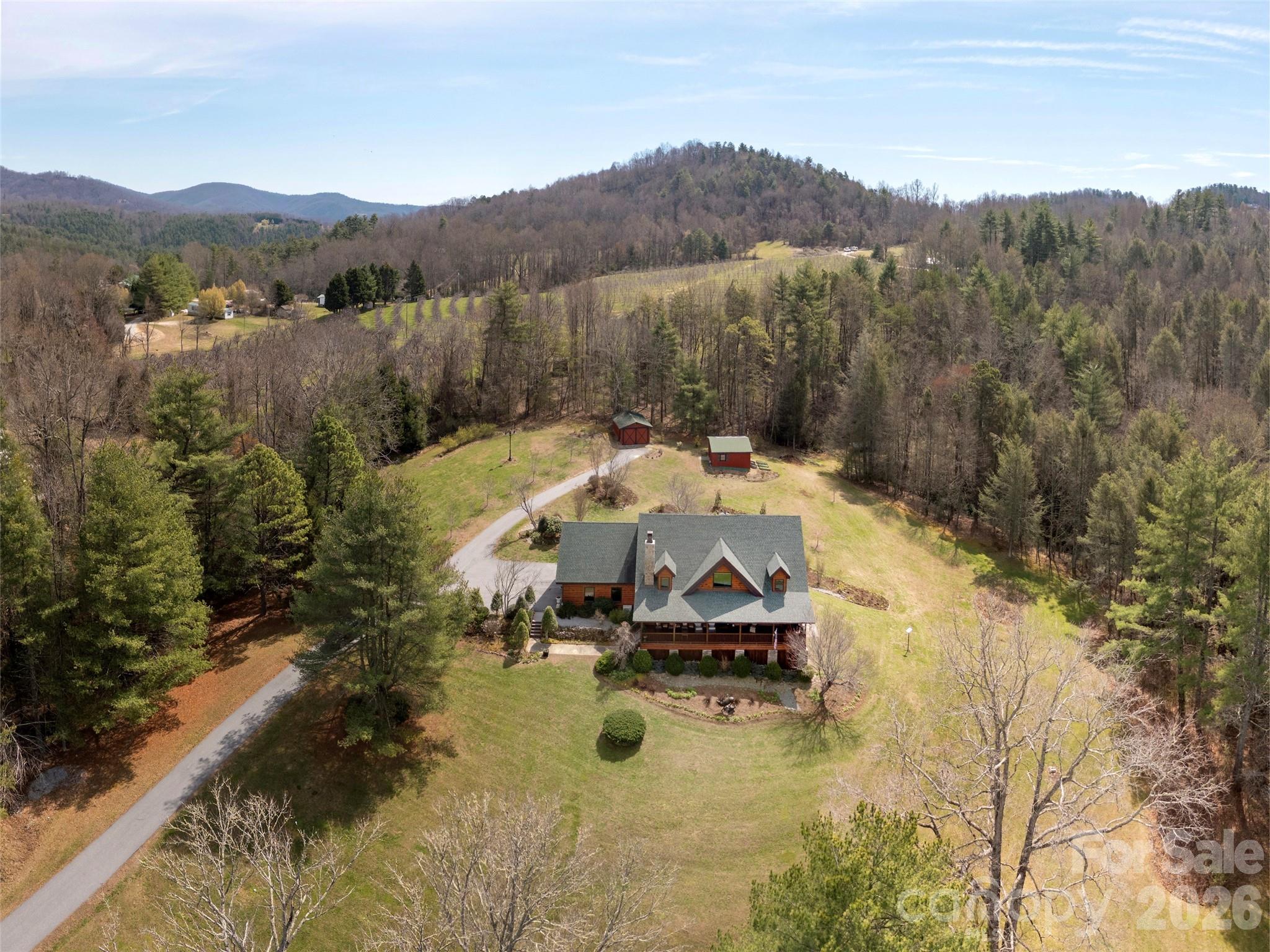 622 Oleta Road Hendersonville, NC 28792 - Photo 1 of 48 a view of a swimming pool with a yard
