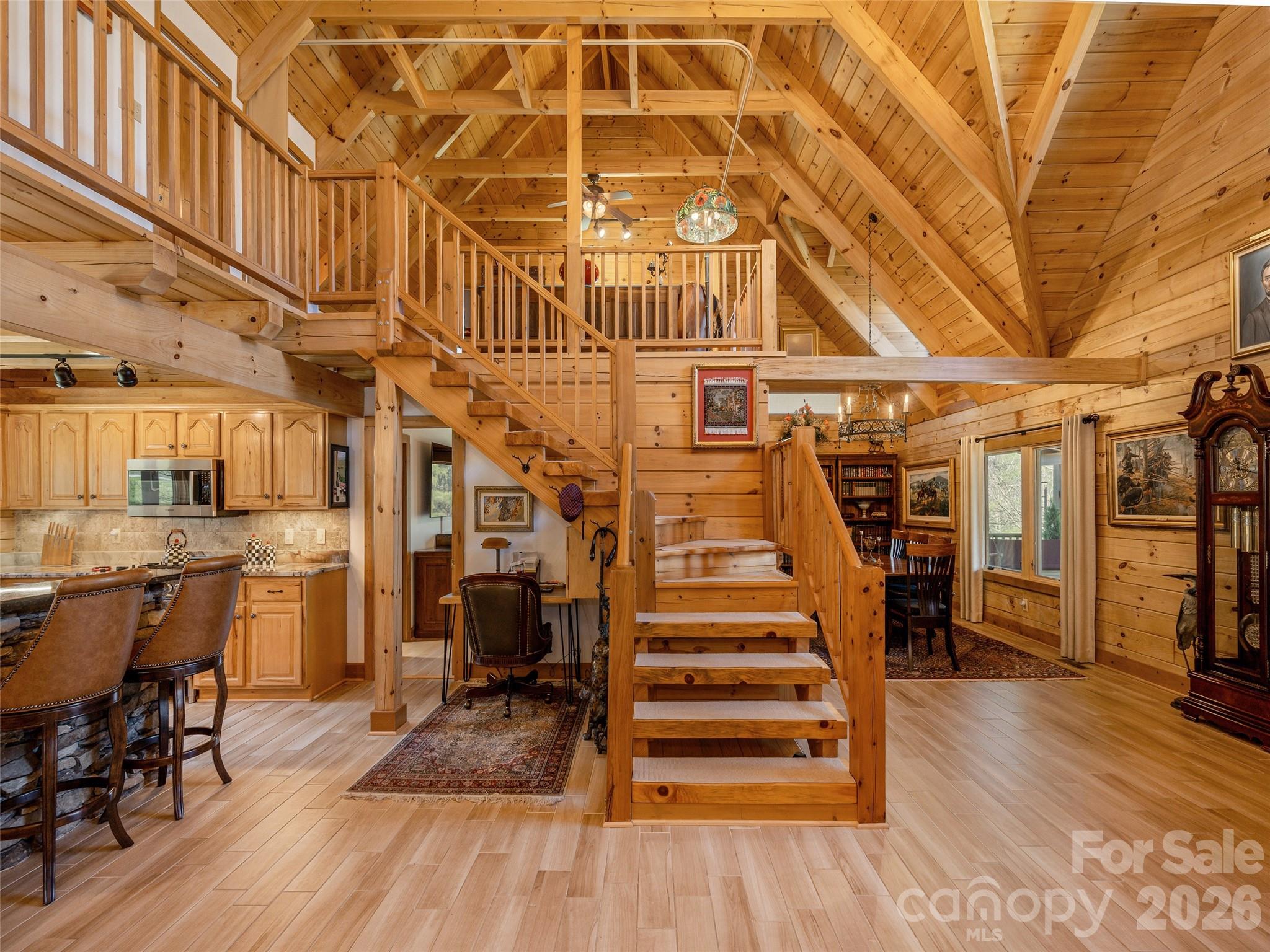 622 Oleta Road Hendersonville, NC 28792 - Photo 14 of 48 a view of entryway and hall with wooden floor