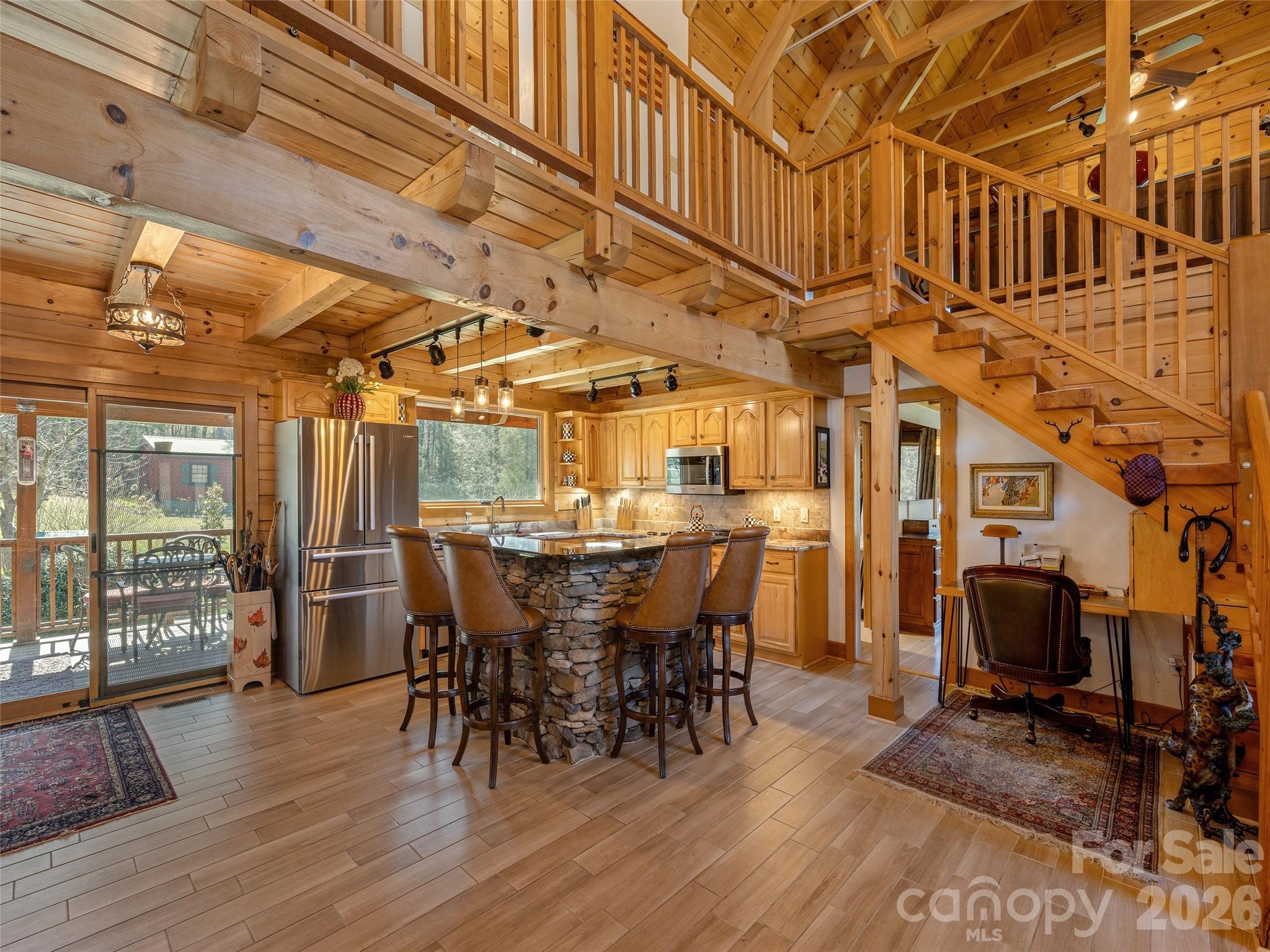 622 Oleta Road Hendersonville, NC 28792 - Photo 15 of 48 a view of a chairs and table in a patio