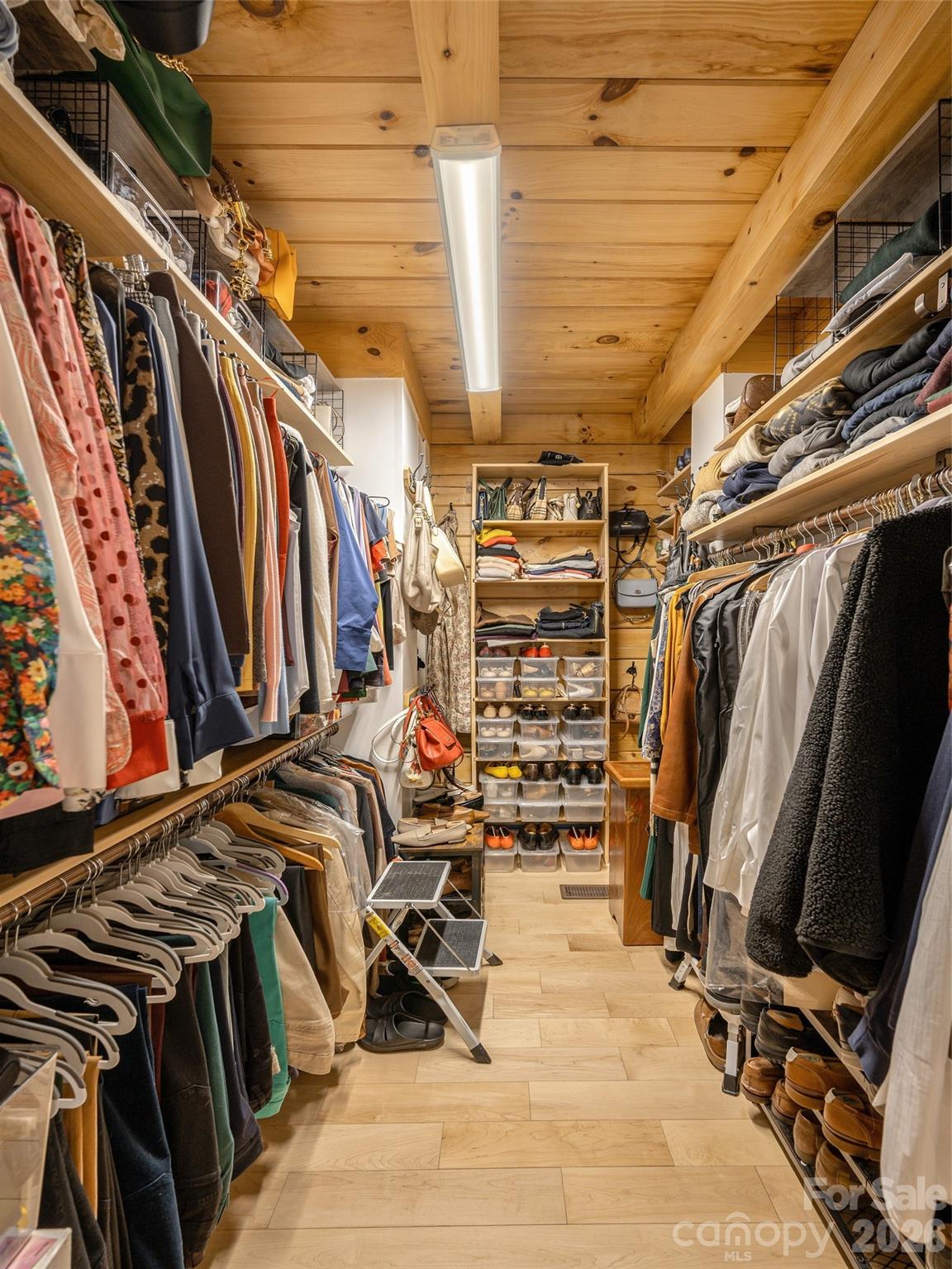 622 Oleta Road Hendersonville, NC 28792 - Photo 23 of 48 a view of walk in closet with clothes