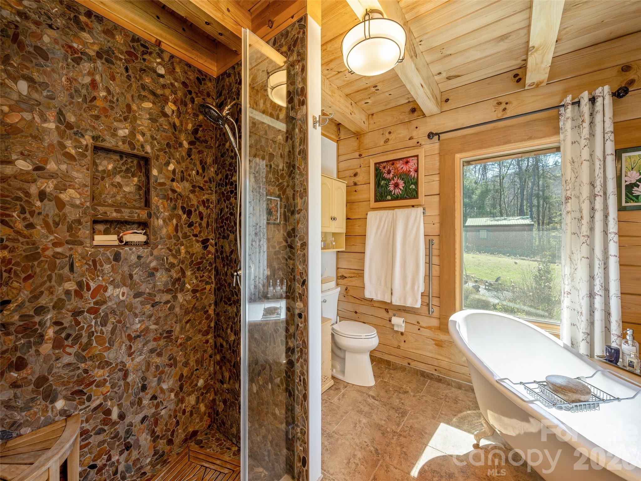 622 Oleta Road Hendersonville, NC 28792 - Photo 25 of 48 a bathroom with a shower and a sink