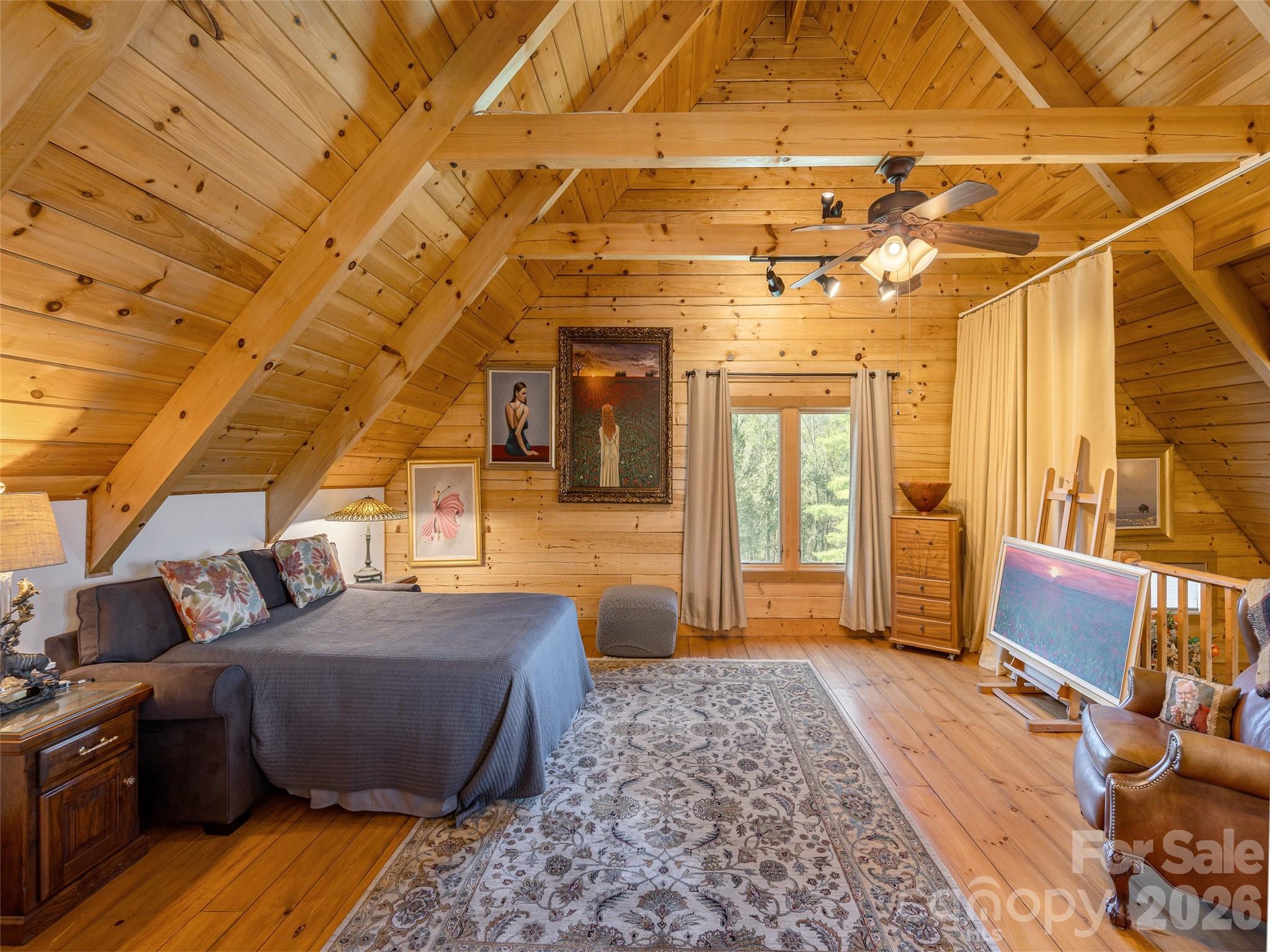 622 Oleta Road Hendersonville, NC 28792 - Photo 30 of 48 a living room with furniture and a rug
