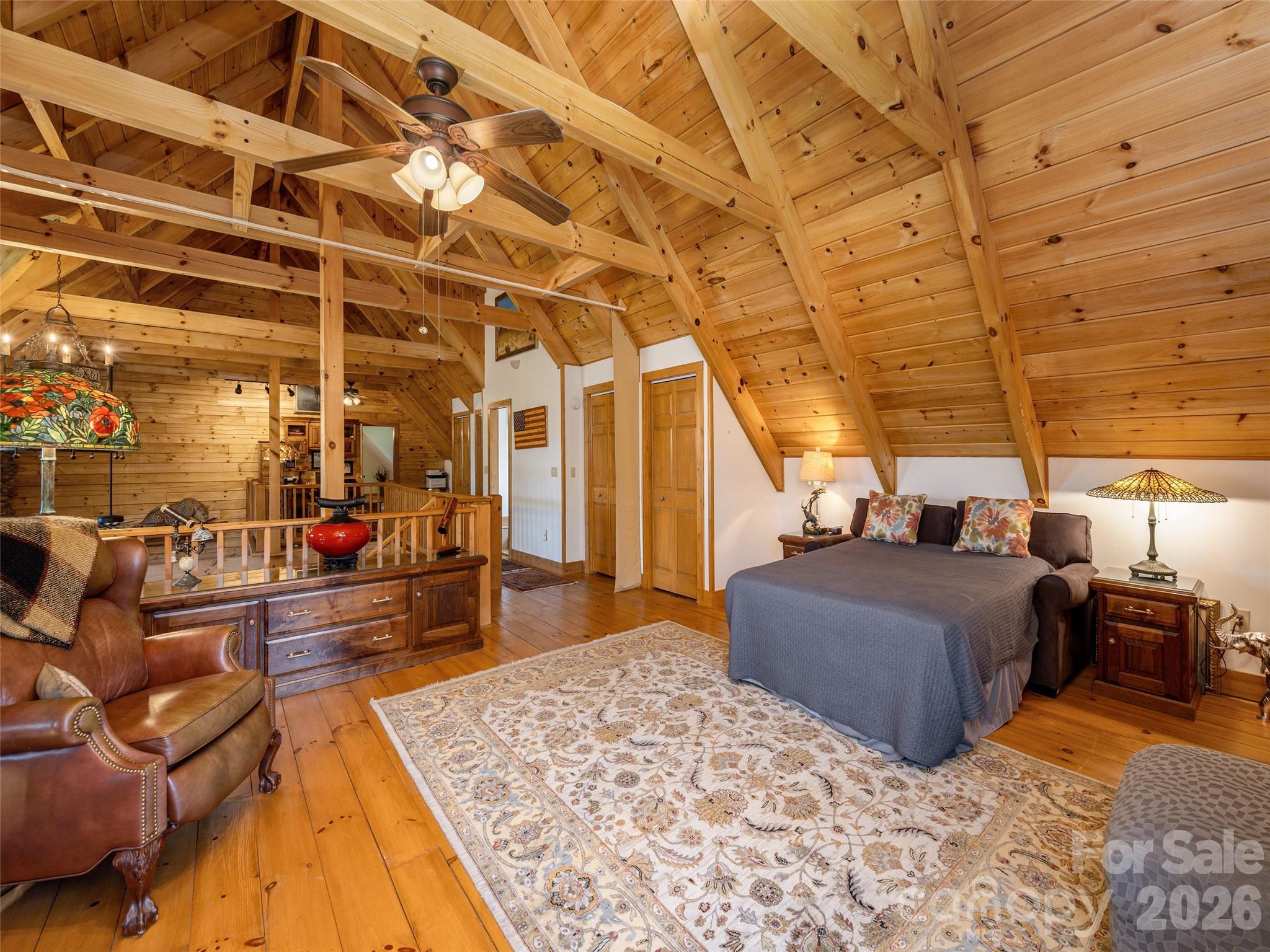 622 Oleta Road Hendersonville, NC 28792 - Photo 31 of 48 a living room with furniture and a wooden floor